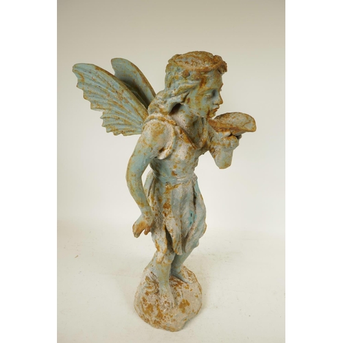 21 - A cast iron garden figure of a fairy drinking from a lily pad, 21