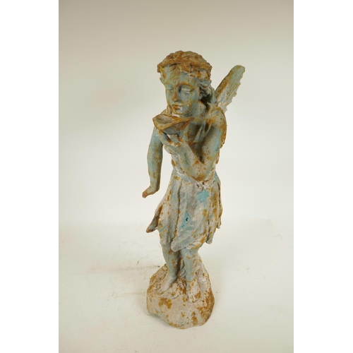 21 - A cast iron garden figure of a fairy drinking from a lily pad, 21