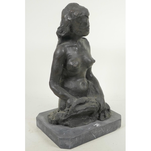 211 - A modernist bronze figure of a female nude, on a slate base, 13½