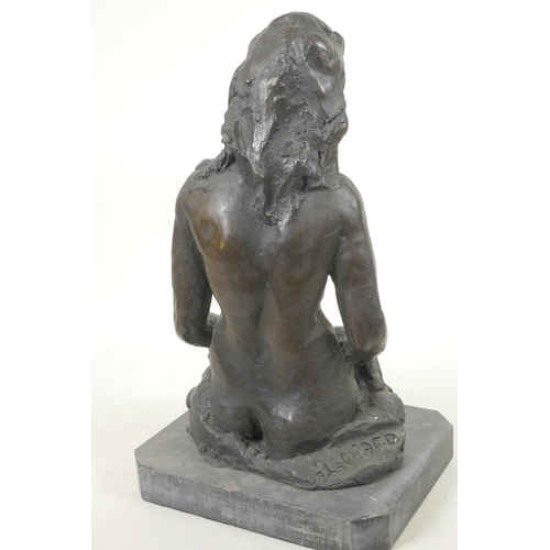 211 - A modernist bronze figure of a female nude, on a slate base, 13½