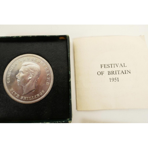 229 - A quantity of British crown coins, mainly Queen Elizabeth II, and three commemorative first day cove... 