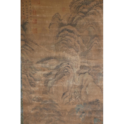 232 - A Chinese watercolour scroll depicting an extensive mountain landscape, 50