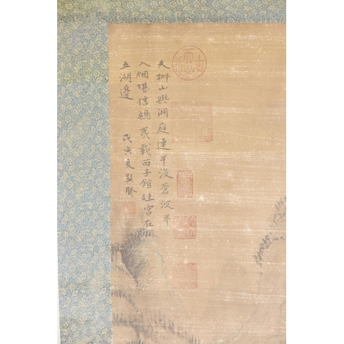 232 - A Chinese watercolour scroll depicting an extensive mountain landscape, 50