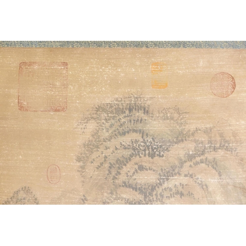 232 - A Chinese watercolour scroll depicting an extensive mountain landscape, 50