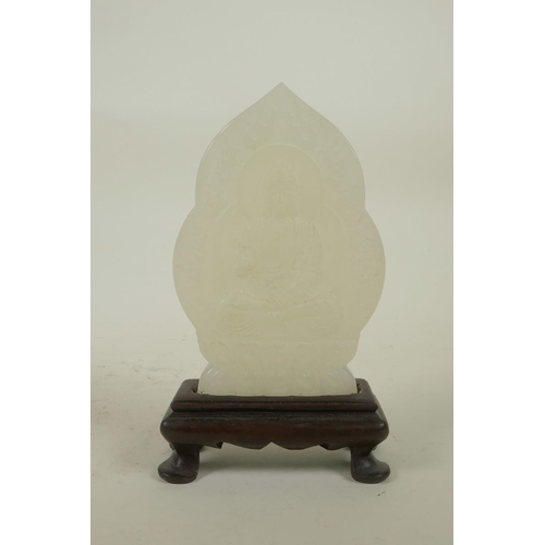 238 - A Chinese white hardstone ornament in a hardwood stand with carved Buddha decoration, 6½