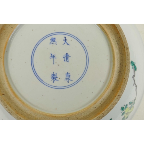 248 - A Chinese famille verte porcelain charger decorated with figures playing Go, 6 character mark to bas... 