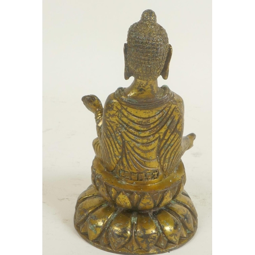 252 - A small Chinese brass figurine of Buddha seated in meditation embellished with turquoise and coral b... 