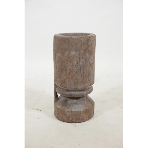 26 - An African carved tree stump mortar, 16