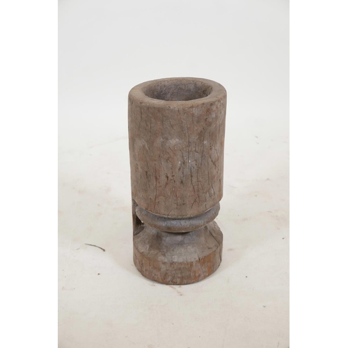 26 - An African carved tree stump mortar, 16