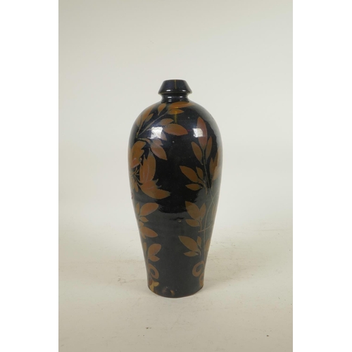 278 - A Chinese Cizhou kiln vase with leaf decoration, 11½