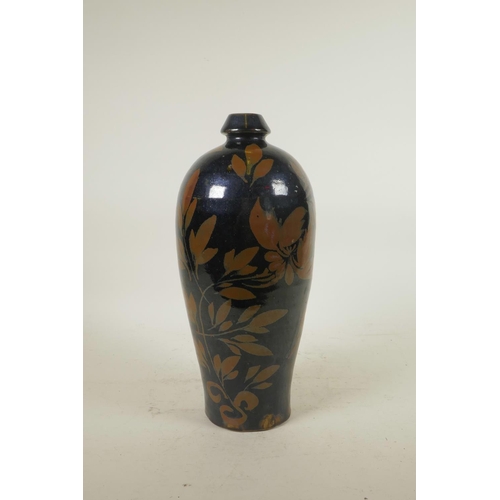 278 - A Chinese Cizhou kiln vase with leaf decoration, 11½