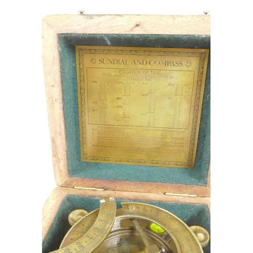 289 - A brass sundial compass in a hardwood box, 4