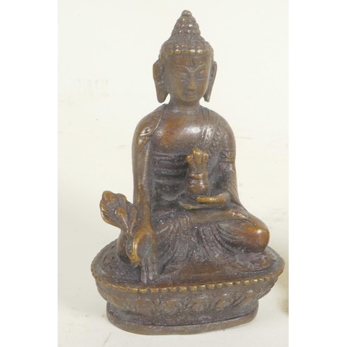 302 - A Chinese bronze figure of Buddha, 3