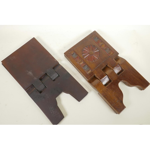 309 - An Indian carved hardwood book rest and another, together with an Indian turned and carved wood frui... 