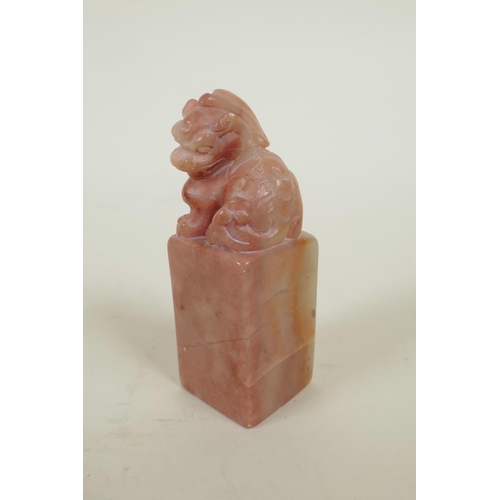 315 - A Chinese soapstone seal blank with carved kylin surmount, 3