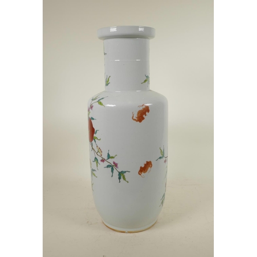 318 - A Chinese polychrome porcelain Rouleau vase with enamelled peach tree decoration, 18