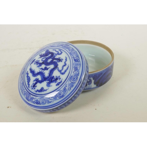 348 - A Chinese blue and white porcelain cylinder box and cover with dragon decoration, 6 character mark t... 