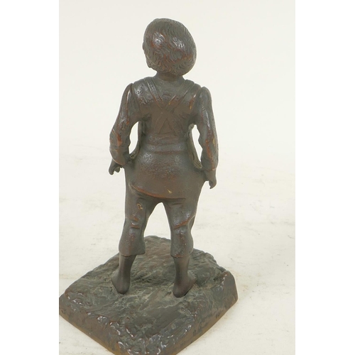 357 - A small bronze figure of a boy, 6½