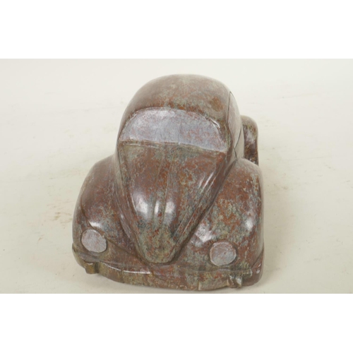 366 - A carved cobalt stone artwork in the form of a Volkswagen Beetle, 7½