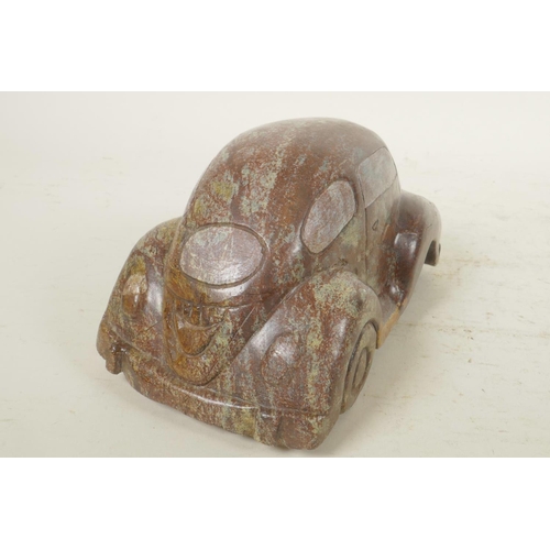 366 - A carved cobalt stone artwork in the form of a Volkswagen Beetle, 7½