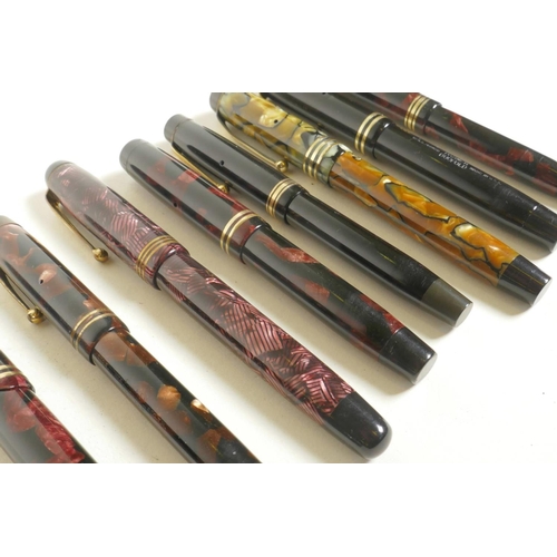 372 - A collection of eight Parker 'Duofold' fountain pens, US and Canadian made, some with 14ct gold nibs... 