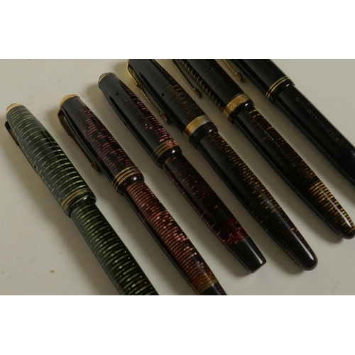 373 - A collection of six Parker 'Vacumatic' fountain pens, US and Canadian made, with 14 gold nibs, large... 