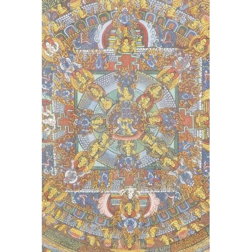 377 - A hand painted Tibetan silk thangka, 11