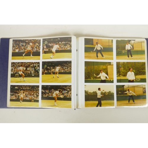 378 - An album of 1970s/80s photographs of professional tennis players, to include a signed photograph of ... 