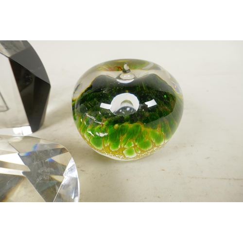 380 - Two studio glass paperweights together with a large heart shaped pyramid paperweight and an Art Deco... 