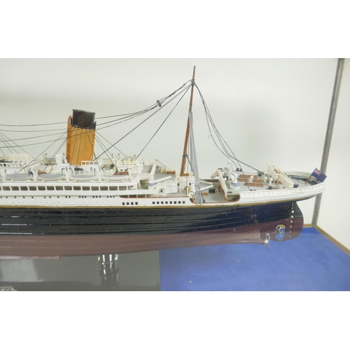 389 - A cased model of RMS Titanic, 28