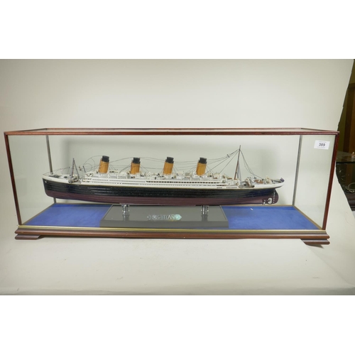 389 - A cased model of RMS Titanic, 28