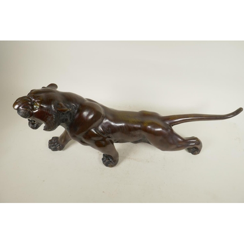 390 - A Japanese bronze figure of a tiger, 25