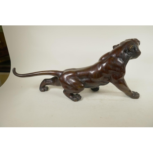 390 - A Japanese bronze figure of a tiger, 25