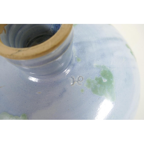 394 - A studio pottery tazza with a splash green glaze, 10