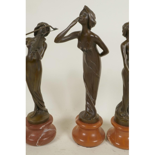 4 - Three Art Nouveau style figures of ladies, 9