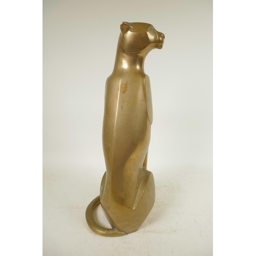 410 - An Art Deco stylised bronze figure of a seated jaguar, 15¾