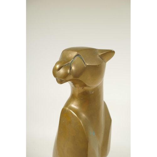 410 - An Art Deco stylised bronze figure of a seated jaguar, 15¾