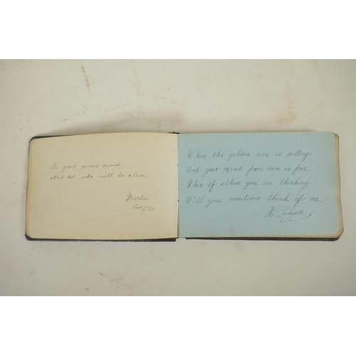 447 - An early C20th autograph book containing portrait paintings, sketches and poems