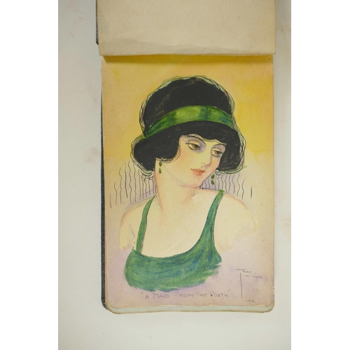 447 - An early C20th autograph book containing portrait paintings, sketches and poems