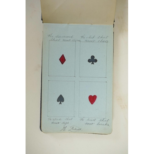 447 - An early C20th autograph book containing portrait paintings, sketches and poems