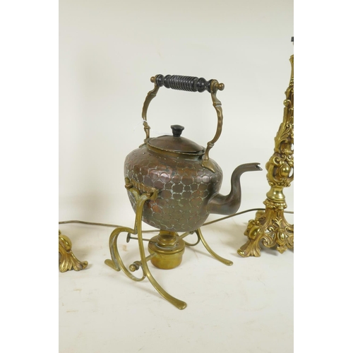 449 - A pair of bronzed metal lamps on triform bases with gadrooned and swag moulded decoration, together ... 