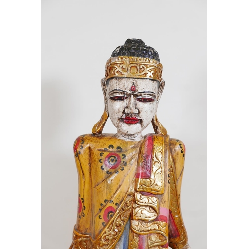 452 - An Indian carved and painted wood figure of Buddha, A/F, 41