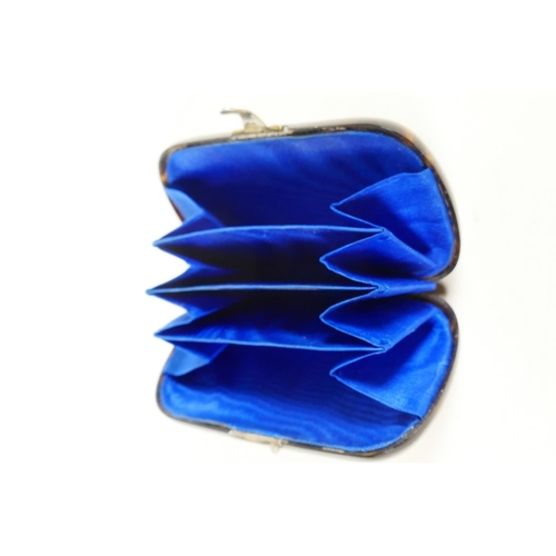 455 - A C19th tortoiseshell pocket purse with silver vacant cartouche and blue silk interior, 3