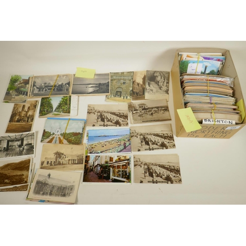 458 - A box of vintage postcards including India, Tripoli, USA, Europe and UK, approximately 600