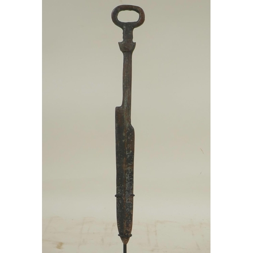 465 - A Chinese bronzed metal dagger, on a display mount, 12