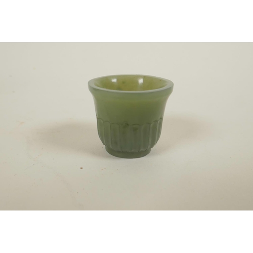 469 - A Mughal miniature celadon jade cup, 1