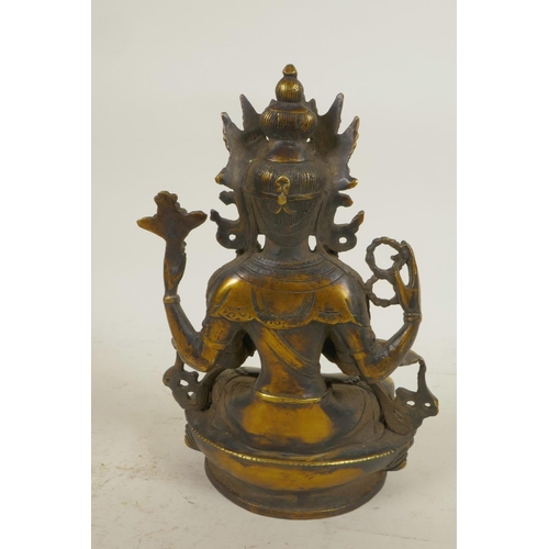 47 - A Chinese bronze figure of a Buddhist deity seated in meditation, 8