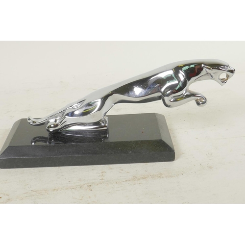 51 - A desk top chrome plated paperweight in the form of a Jaguar car mascot, 7½