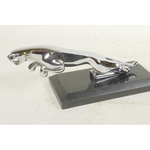 51 - A desk top chrome plated paperweight in the form of a Jaguar car mascot, 7½