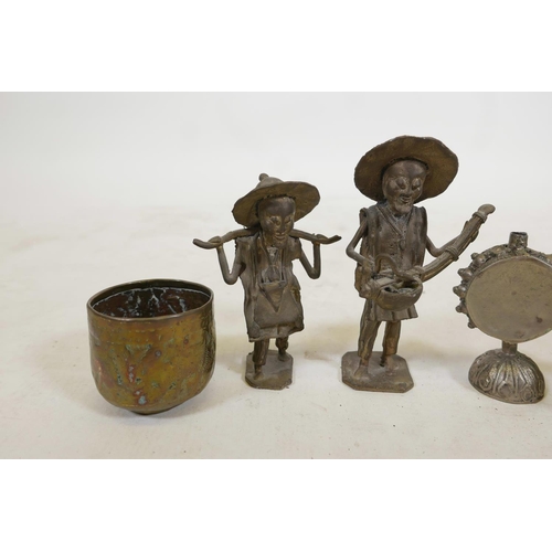 52 - Two Oriental naive bronze figures, together with two Tibetan white metal vessels and a small bronze ... 